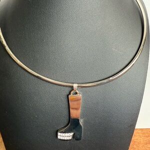 Unique ABBA the museum boot silver tone pendant on torque